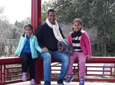 Saibal Sinha and his daughters. "Every single day is a new day," he says. Photo supplied